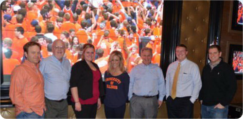 <a href="http://www.stlouisillini.org/" target="_blank">Metro St. Louis Illini Club</a>   members celebrate a men's basketball  "W." 