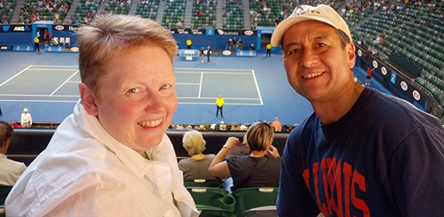 Becky and Victor Andrade '78 ENG at Rod Laver Arena in Melbourne, Australia. The couple hopes to see all of pro tennis' Grand Slam events in person in the coming years. As of 2013, they can check the Australian Open off their bucket list.